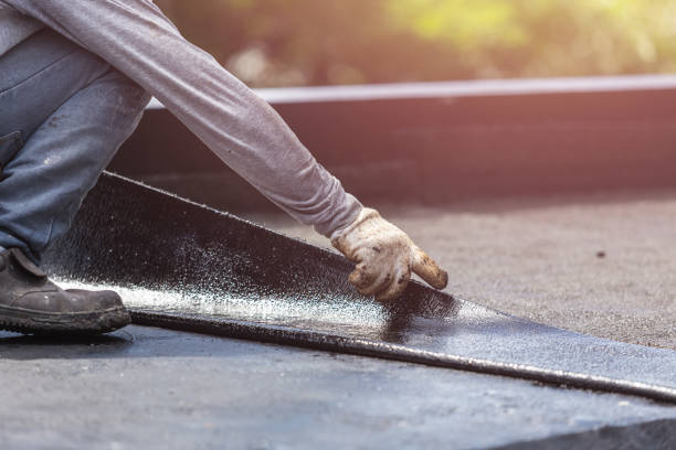 Professional Waterproofing technician working in Roslyn Heights, NY